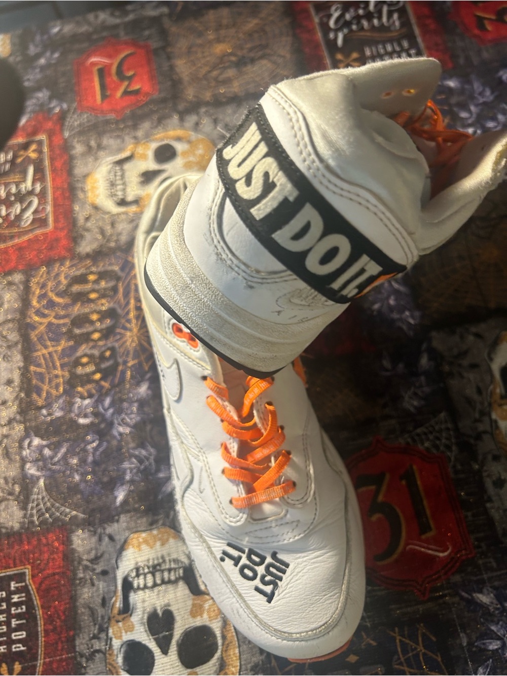 Nike White High-Top Ankle Boots with Orange Laces and Black Strap